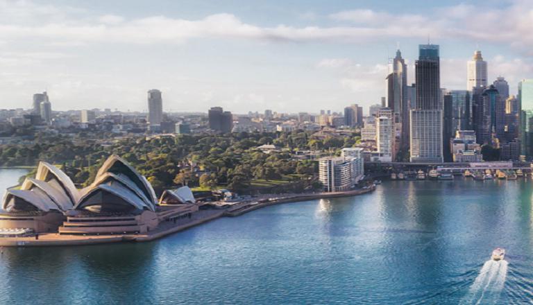 Downtown Sydney’s harbour abuzz with activity and commerce.