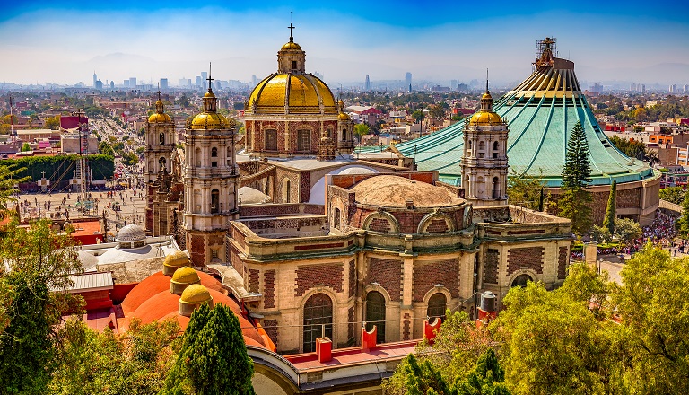 Mexico City cityscape of new and old basilicas