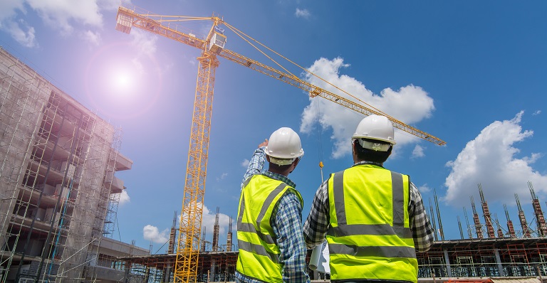 Civil engineers discuss work on U.S. job site