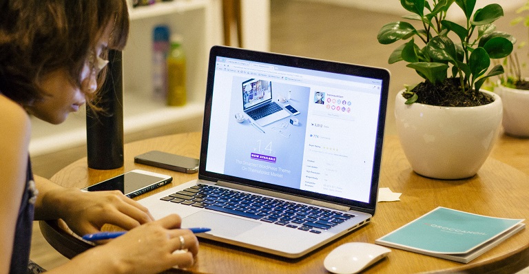 A woman learns more online.