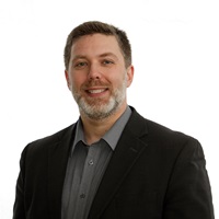 Joel Adams headshot, EDC